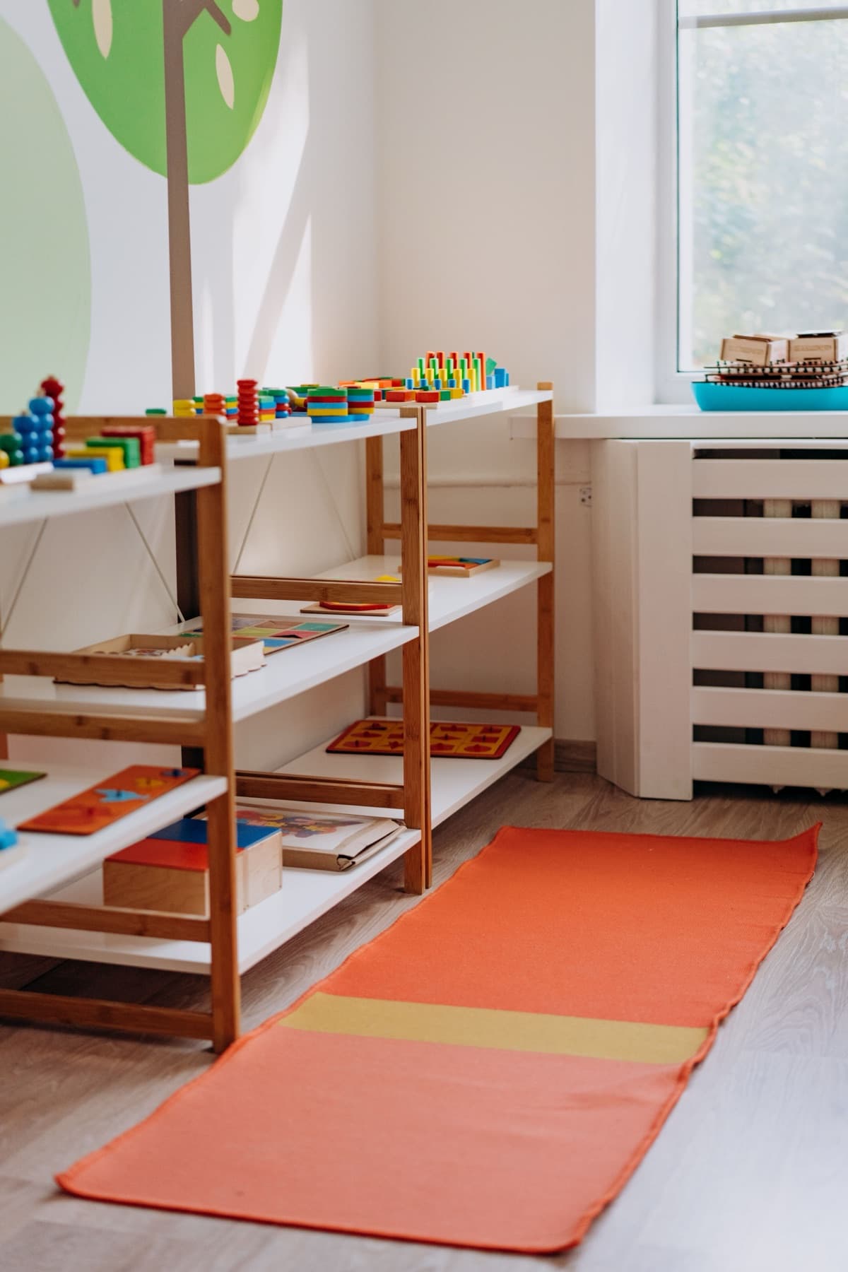 Open classroom shelves of puzzles and materials waiting at the start of the day
